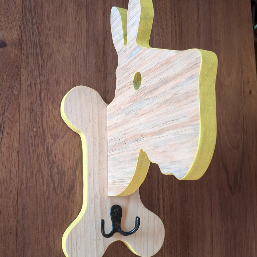 olgador de correas con detalle amarillo